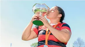  ?? GETTY IMAGES ?? Canterbury captain Stephanie Te Ohaere-Fox kisses the cup.