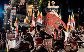  ??  ?? The picture shows the Navam Perahera in procession (Pic AFP)