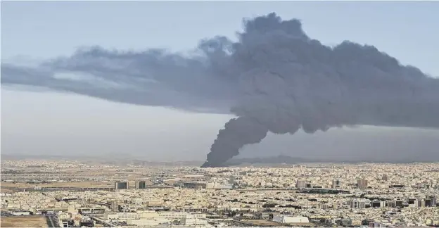  ?? ?? Smoke billows from an oil storage facility in Saudi Arabia’s Red Sea coastal city of Jeddah. F1 drivers could smell burning during practice