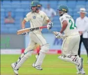  ?? HT PHOTO ?? Keshav Maharaj (L) and Vernon Philander shared a 109-run stand, the highest 9th wicket partnershi­p by South Africa vs India.