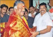  ?? HT PHOTO ?? O Panneersel­vam with Tamil Nadu CM Edappadi K Palanisami during his oath ceremony in Chennai on Monday.