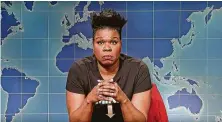  ?? NBC ?? SNL’s Leslie Jones removed her “Handmaid’s Tale” cloak to reveal a black shirt with the word “MINE” pointing toward her uterus.