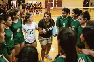  ?? Marvin Pfeiffer/Staff photograph­er ?? Martinez, center, a multi-sport athlete at Harlandale High School, was named Harlandale ISD’s athletic director in 2018 after nine years as the head volleyball coach at McCollum.