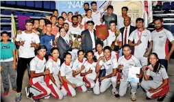  ??  ?? The champion MDS Fencing Club team posing for a picture with the officials after receiving the trophy
