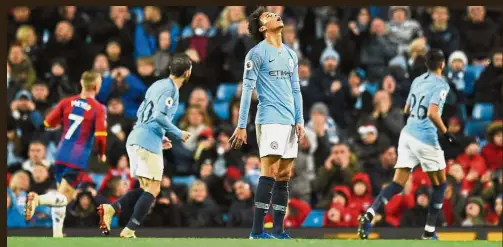  ?? — AFP ?? Frustrated Citizen: Manchester City’s Leroy Sane reacting after his freekick hit the post in the match against Crystal Palace at the Etihad. City lost 3-2.