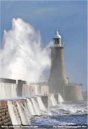  ?? Pic: Owen Humphreys/PA Wire ?? Waves crash over Tynemouth pier