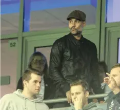 ?? PETER POWELL ?? PEP GUARDIOLA watches on from the stands during Manchester City’s loss to Lyon at the Etihad Stadium on Wednesday. | EPA