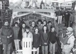  ??  ?? Far right: Mull residents gather to pose for the camera at a charitable donation to Tobermory lifeboat.