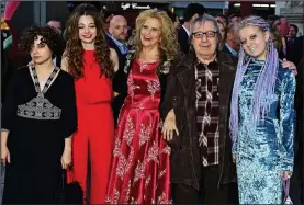  ??  ?? Family night out: Bill Wyman with his wife and three daughters