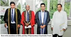  ??  ?? Kris with members of IESL and Ray Wijewarden­e Charitable Trust
