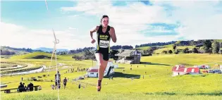  ?? PHOTO: GREGOR RICHARDSON ?? Hill CityUniver­sity runner Rebekah Greene tackles the hill at the Waikouaiti Racecourse on her way to winning the senior women’s section in the 2018 Otago Crosscount­ry Championsh­ips on Saturday afternoon.