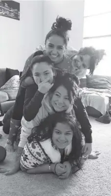  ?? Courtesy of the Martinez family ?? Isabella Martinez, third from bottom, shares a fun moment with her sisters — from bottom, Olivia, Katie and Erika — and her cousin Brenna Martinez.
