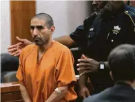  ?? Yi-Chin Lee / Staff photograph­er ?? Robert Solis, 47, appears before Judge Chris Morton on Monday at the Harris County Criminal Courthouse.