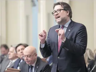  ?? JACQUES BOISSINOT/THE CANADIAN PRESS/FILES ?? Immigratio­n Minister David Heurtel says the CAQ’s plan amounts to “you must fear immigratio­n and that’s scary.” He said Quebec and Canada were and are built on immigratio­n.