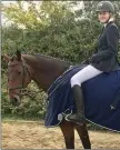  ??  ?? Harriet Bernon with Miss Poppins wearing one of the winning rugs which were sponsored by O’Reilly’s fine art Auction Rooms.