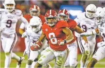  ?? BUTCH DILL/ASSOCIATED PRESS ?? Alabama running back Josh Jacobs carries the ball during Saturday’s game against Mississipp­i State in Tuscaloosa, Ala. The Crimson Tide is still No. 1 in the latest College Footbal Playoff rankings, released Tuesday.