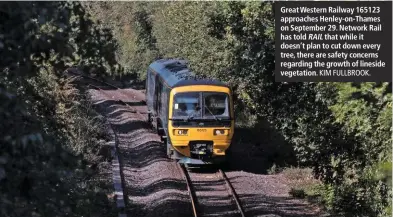  ?? KIM FULLBROOK. ?? Great Western Railway 165123 approaches Henley-on-Thames on September 29. Network Rail has told RAIL that while it doesn’t plan to cut down every tree, there are safety concerns regarding the growth of lineside vegetation.