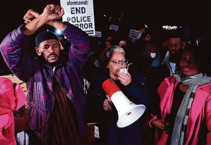  ?? Patrick Lantrip/Associated Press ?? Protesters chant “Hands up, don’t shoot” during a demonstrat­ion in Memphis on Friday over the death of Tyre Nichols.