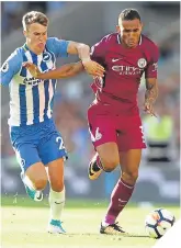  ??  ?? City’s Danilo holds off Solly March.