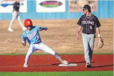  ?? JON AUSTRIA / JOURNAL ?? Sandia’s Talan Barraza motions to his teammates after reaching second base during Wednesday’s game against Volcano Vista at Sandia High School.