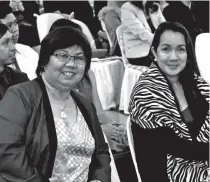  ??  ?? Former PAREB National President Engr. Leonora Gutierrez (left), AVP for Mindanao of Megaworld and Suntrust Properties Inc., with PAREB-DBRFI President Patricia Paula Ann De Jesus.