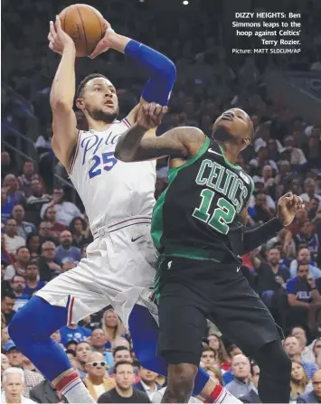  ?? Picture: MATT SLOCUM/AP ?? DIZZY HEIGHTS: Ben Simmons leaps to the hoop against Celtics' Terry Rozier.
