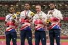  ?? Photograph: Martin Meissner/AP ?? From left: CJ Ujah, Zharnel Hughes, Richard Kilty and Nethaneel Mitchell-Blake at the medal ceremony in Tokyo.