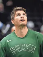  ?? ASSOCIATED PRESS ?? Kyle Korver has mixed emotions about living in the NBA's bubble while he's unable to help out with his growing family at home.