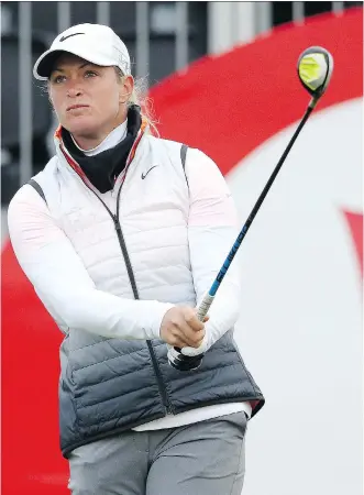  ?? SCOTT HEPPELL/ THE ASSOCIATED PRESS ?? Suzann Pettersen of Norway follows through on a tee shot during Friday’s second-round action at the Women’s British Open at the Turnberry golf course in Scotland. Pettersen shot a 3-under 69 to lead the tournament with a 7-under 137 at the midway point.