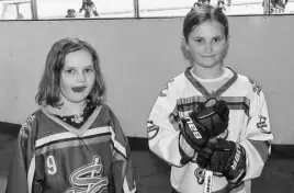 ??  ?? Ringette players Sidney Carter, left, and Ema Carter are this proud columnist’s granddaugh­ters.