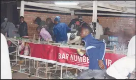  ??  ?? Revellers loot beverages during the mayhem that prematurel­y ended the Busy Signal/Busiswa gig last week