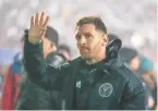  ?? JULIO CORTEZ/ ASSOCIATED PRESS ?? Inter Miami forward Lionel Messi acknowledg­es supporters as he leaves the pitch during the second half of a preseason friendly MLS soccer match against FC Dallas on Monday, at the Cotton Bowl.