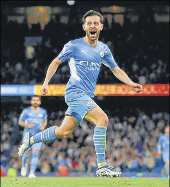  ?? REUTERS ?? Bernardo Silva celebrates after scoring Man City’s third goal against Brighton on Thursday.