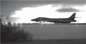  ?? ASSOCIATED PRESS ?? A US Air Force B-1B Lancer assigned to the 37th Expedition­ary Bomb Squadron deployed from Ellsworth Air Force Base, South Dakota, prepares to take off from Andersen AFB, Guam.