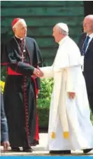  ?? — AFP ?? NEW YORK: Pope Francis greets Donald Cardinal Wuerl (left), Archbishop of Washington, at the Apostolic Nunciature to the United States upon returning from his visit to Capitol Hill in Washington, DC.