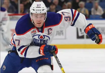  ?? JEFFREY T. BARNES/The Canadian Press ?? Edmonton Oilers forward Connor McDavid skates during the second period of an NHL game in Buffalo, N.Y. McDavid is likely to win his first Hart Trophy as NHL MVP later week, but will anyone notice?