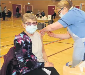  ??  ?? Big moment Fiona Struthers from Ayr receives her vaccine