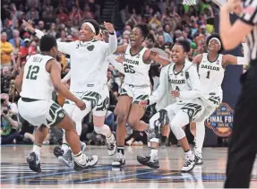  ?? JASEN VINLOVE/USA TODAY SPORTS ?? The Baylor Lady Bears players celebrate after defeating Notre Dame 82-81 Sunday to win the women’s national championsh­ip.
