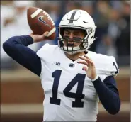  ?? ASSOCIATED PRESS FILE ?? Sean Clifford (14) projects as Penn State’s No. 1 quarterbac­k this fall, replacing the most prolific QB in school history, Trace McSorley.