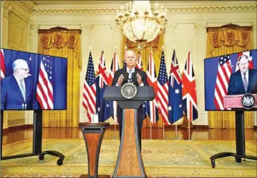  ?? AFP ?? US President Joe Biden during a virtual press conference on national security with British Prime Minister Boris Johnson (right) and Australian Prime Minister Scott Morrison at the White House on September 15.