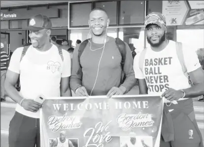  ??  ?? The trio of Gordon James (left), Anthony Moe (center) and Delroy James arriving in Guyana