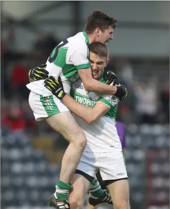  ??  ?? Kanturk’s Liam O’Keeffe and James Fitzpatric­k celebrate at the final whistle of last weekend’s County Intermedia­te Football Championsh­ip Final where they claimed victory over Mitchelsto­wn by a single point Photo by Eric Barry