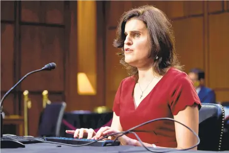  ?? SHAWNTHEW/ POOL/GETTY-AFP ?? Laura Wolk, the first blind woman to clerk at the Supreme Court and a former student of Barrett’s at Notre Dame Law School, testifies during the Senate Judiciary Committee confirmati­on hearing of Amy Coney Barrett on Thursday.