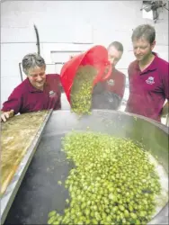  ?? Pictures: Andy Payton FM3995362/FM3995351 Buy pictures at www.kentonline.co.uk ?? Tony Williams, Nigel Deas, and Mark Stroud add hops to boiling water and right, at Musket Brewery