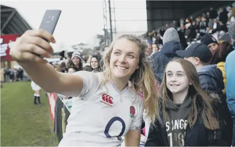  ?? ?? Scarboroug­h’s Zoe Aldcroft interacts with England fans after a Six Nations game against Wales in 2020 (Photo by Luke Walker/Getty Images)