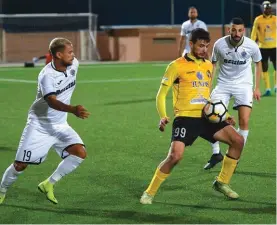  ??  ?? Action from the Hibernians­Qormi match yesterday Photo: James Galea