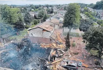  ?? HO THE CANADIAN PRESS ?? Debris is shown following a Wednesday house explosion on Sprucedale Crescent in Kitchener, Ont.