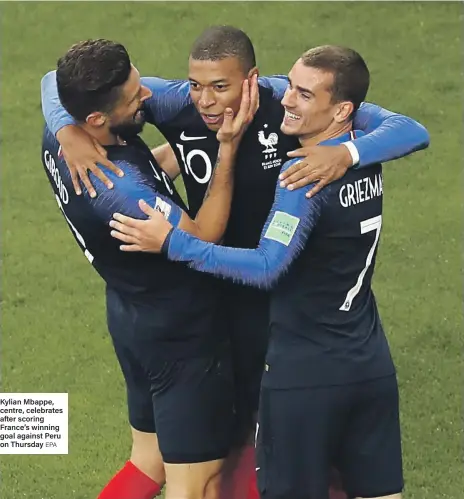  ?? EPA ?? Kylian Mbappe, centre, celebrates after scoring France’s winning goal against Peru on Thursday