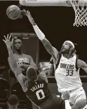  ?? Michael Ainsworth / Associated Press ?? Mavericks center Willie Cauley-Stein (33) has provided some defensive help, but Dallas needs much more for a shot at the playoffs.