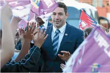  ?? GETTY IMAGES ?? Billy Slater of the Melbourne Storm is welcomed by fans during the 2018 NRL Fan Day.